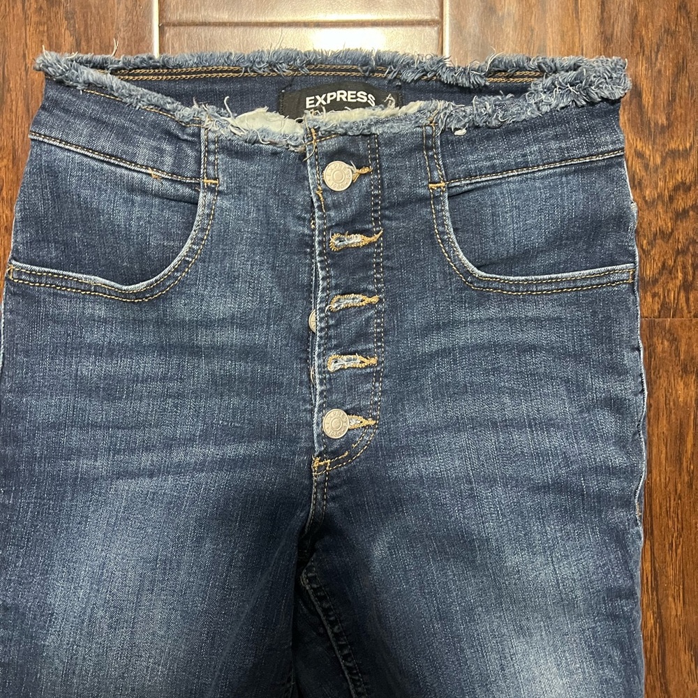 Express distressed skinny jeans